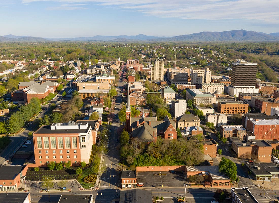 Henrico, VA - Aerial Perspective Over Downtown Lynchburg Virginia at Days End
